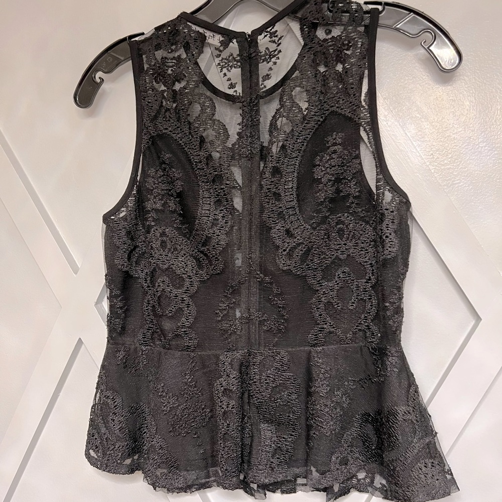 Beautiful lace black top with peplum. For Love & Lemons. Sz S.